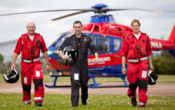 Three members of the Devon Air Ambulance air crew out in the field