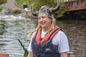 A viking in the 2019 Dragon Boat Festival contemplates their strategy