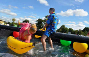 Fundraisers have fun with inflatables on the river