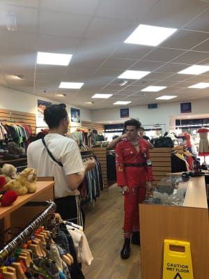 Alternative rock star Yungblud peruses shelves in the Devon Air Ambulance Plymouth store