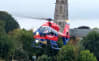 The EC 145 helicopter landing in a local community setting