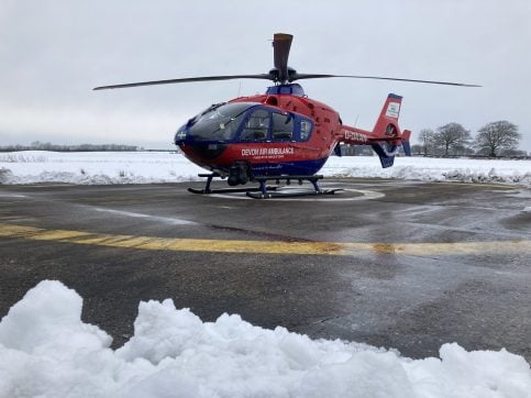 Helicopter on landing pad in the snow
