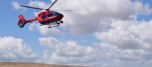 The Devon Air Ambulance aircraft over Dartmoor