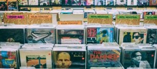 A rack of CDs in a shop