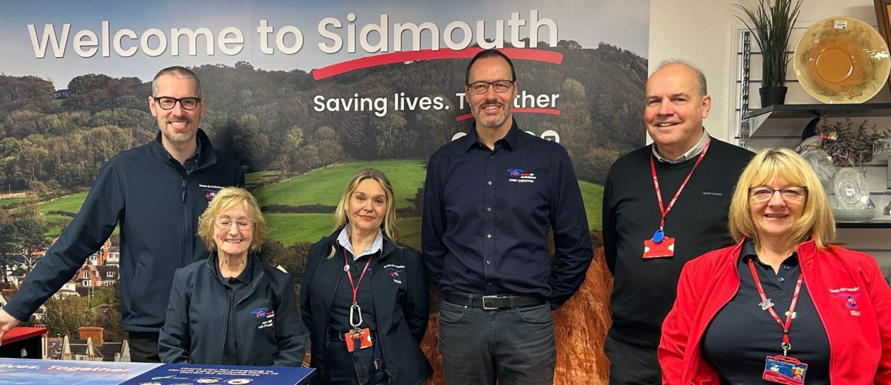 Devon Air Ambulance team celebrate the reopening of our Sidmouth shop