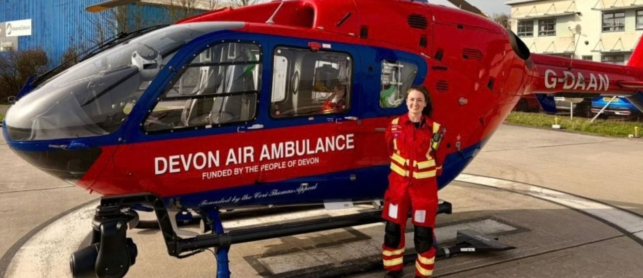 Dr Emily Foote alongside the aircraft