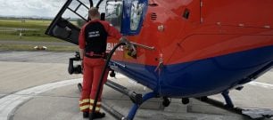 A member of our crew refuels the aircraft