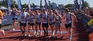 Team Olly celebrates crossing the finishing line